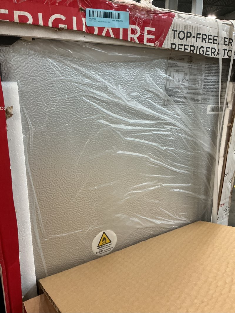 Condition photo showing As Is for Frigidaire 21.5 in. 7.5 cu. ft. Top Freezer Refrigerator in Black