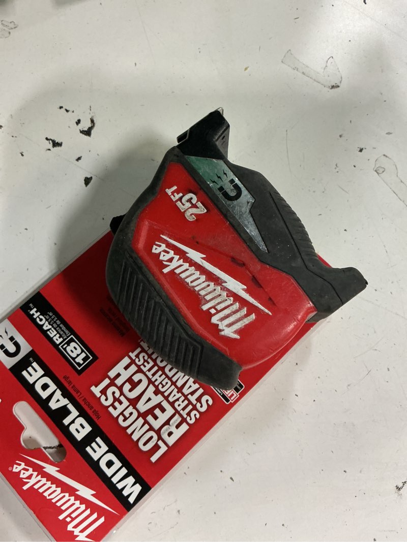 Condition photo showing As Is for milwaukee 25 ft. l x 1-5/16 in. w wide blade magnetic tape measure 1 pk