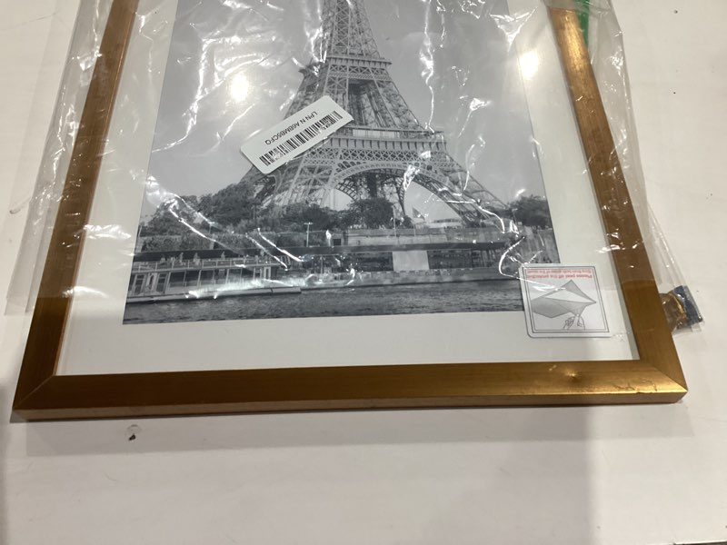 Condition photo showing As Is for upsimples 11x17 Picture Frame, Display Pictures 9x15 with Mat or 11 x 17 Without, Wall Hanging Poster Frames, Bronze, 1 Pack Bronze 11x17