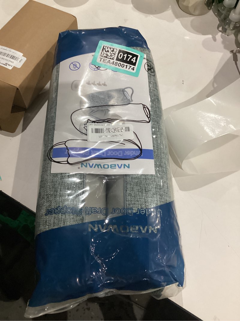 Condition photo showing As Is for NABOWAN 36" Weighted Under Door Draft Stopper -Triangular Door Draft Blocker with Hook Loops for Easy Install, Save Energy, Home Room Essentials 36 Inch Gray