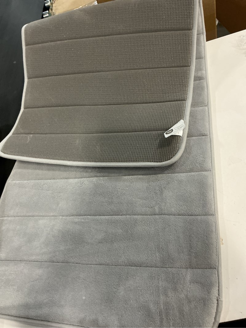 Condition photo showing Good Condition for Buganda Memory Foam Bath Mat, 59" x 20", Ultra Soft and Non-Slip Bathroom Rugs, Water Absorbent and Machine Washable Bath Rug Runner for Bathroom, Shower, and Tub, Medium Grey Medium Grey Rectangular 59" x 20"