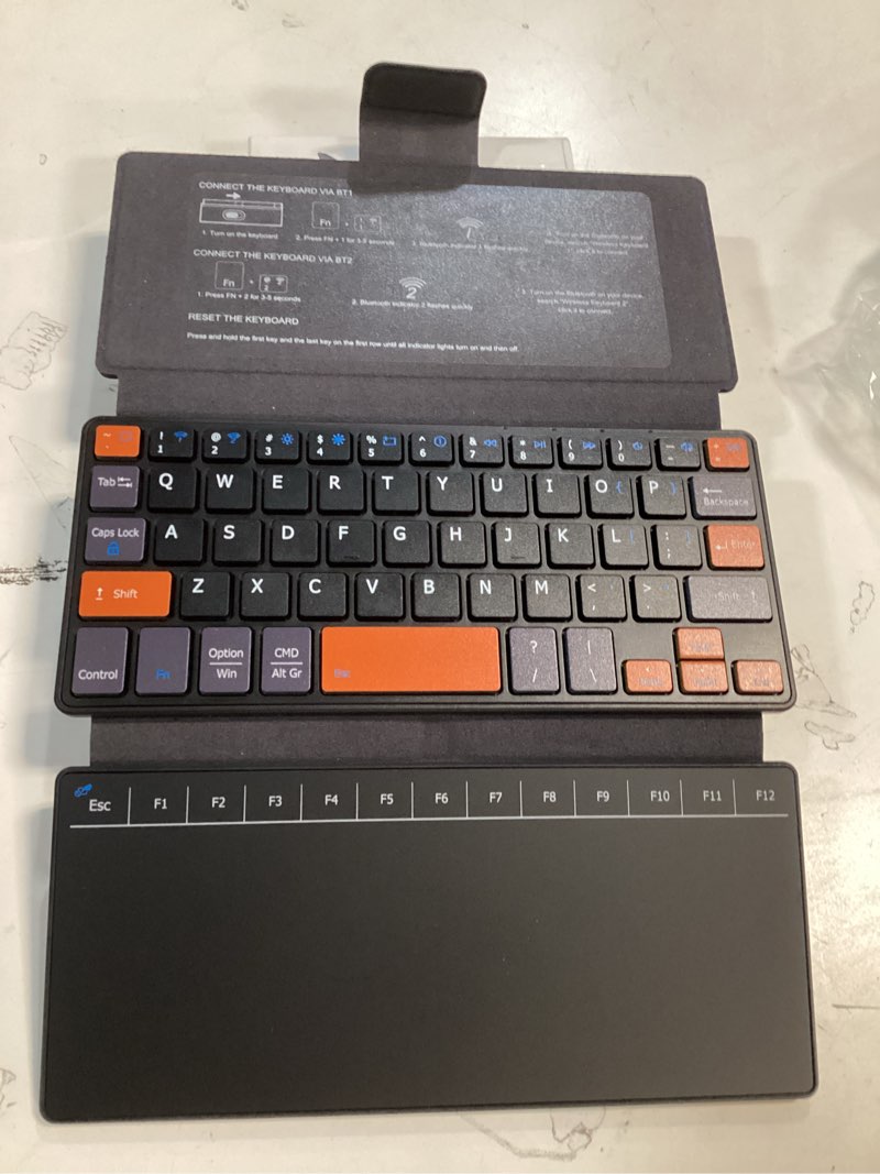 Condition photo showing Good Condition for Doohoeek Travel Keyboard with Touchpad, Universal Compact Keyboard with Large Trackpad & Any-Angle Stand for Android/iOS/Windows, Dual-Device Bluetooth Keypad for Phones/Galaxy Z Fold/iPad mini