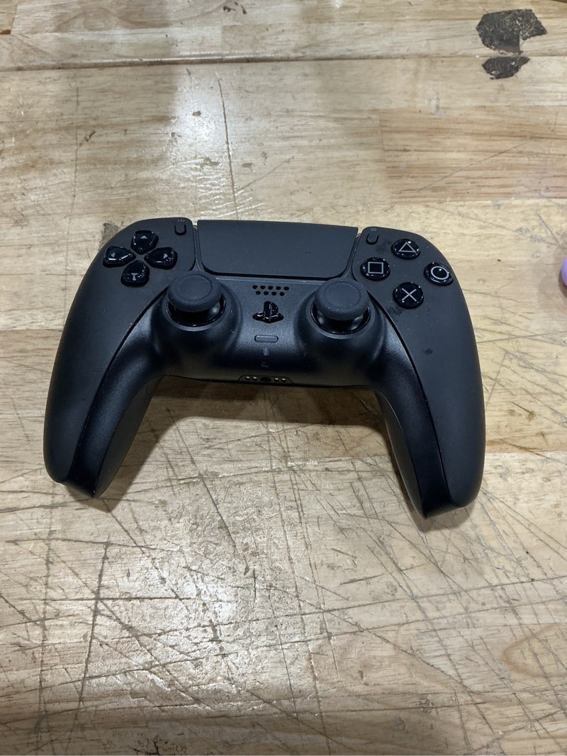 Condition photo showing As Is for playstation dualsense wireless controller for playstation 5, midnight black
