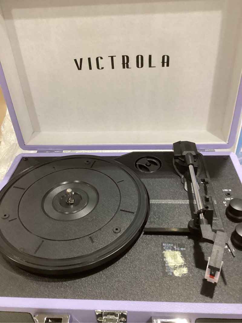 Condition photo showing Good Condition for Victrola Journey Bluetooth Portable Suitcase Record Player – with Built-in Speakers, 3 Speed Vinyl Record Player, RCA Out, Headphone Jack (Lavender/Silver)