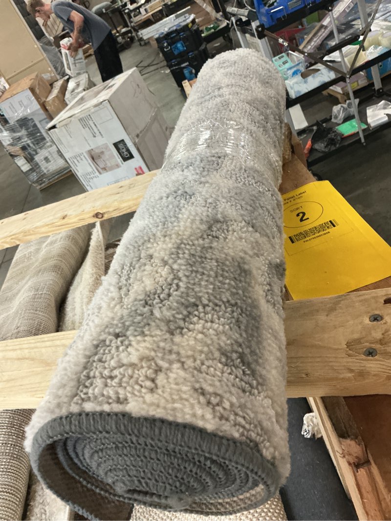 Condition photo showing As Is for grey runner rug