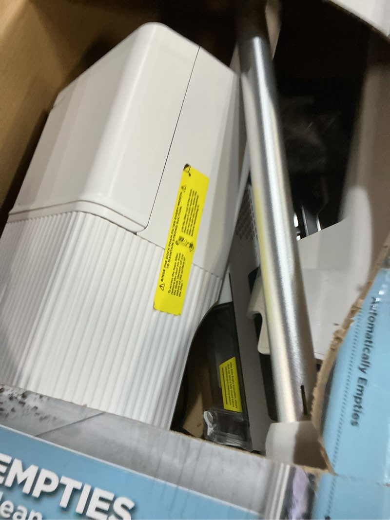 Condition photo showing As Is for Shark Clean & Empty Cordless Stick Vacuum – Lightweight Cordless with HEPA Filter, Portable, Rechargeable, Auto-Empty System, Stick Vacuum for Pet Hair, Carpets & Hardfloor, White, BU3521 w/ Pet Multi-Tool