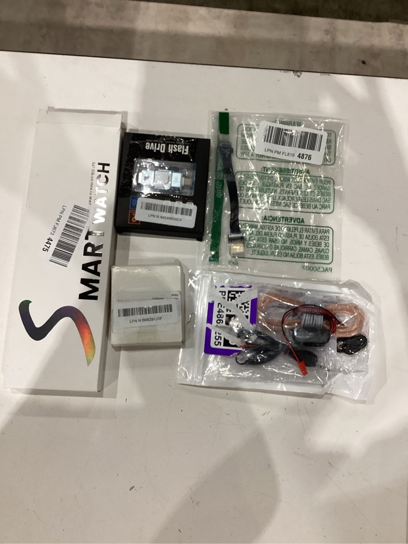 Condition photo showing As Is for assorted lot of electronics (headphones, small gadgets, headsets, etc