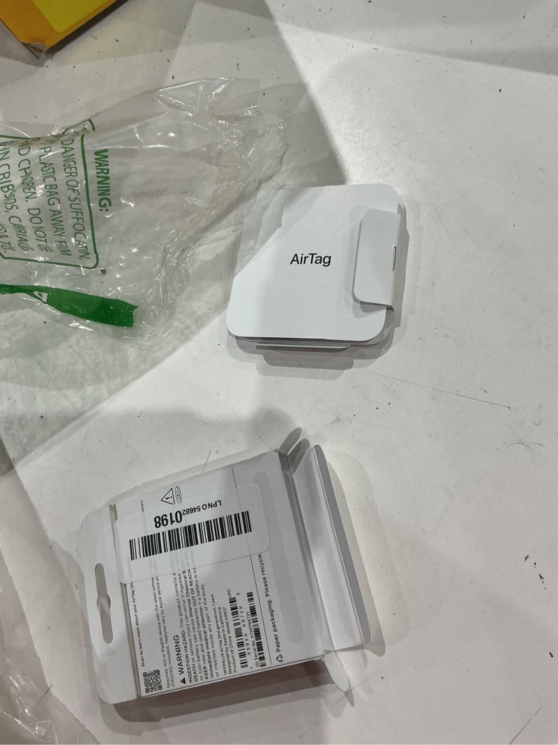 Condition photo showing As Is for apple airtag (2nd generation): tracker for keychain, wallet, and more; locator with sound; simple one-tap setup with iphone or ipad; key finder with up to 1.5x precision finding range 1 pack