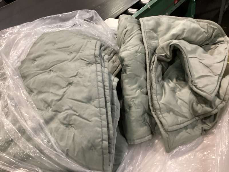 Condition photo showing As Is for bamboo dream quilt pillow  full/queen (color green ) (3 pieces ) 