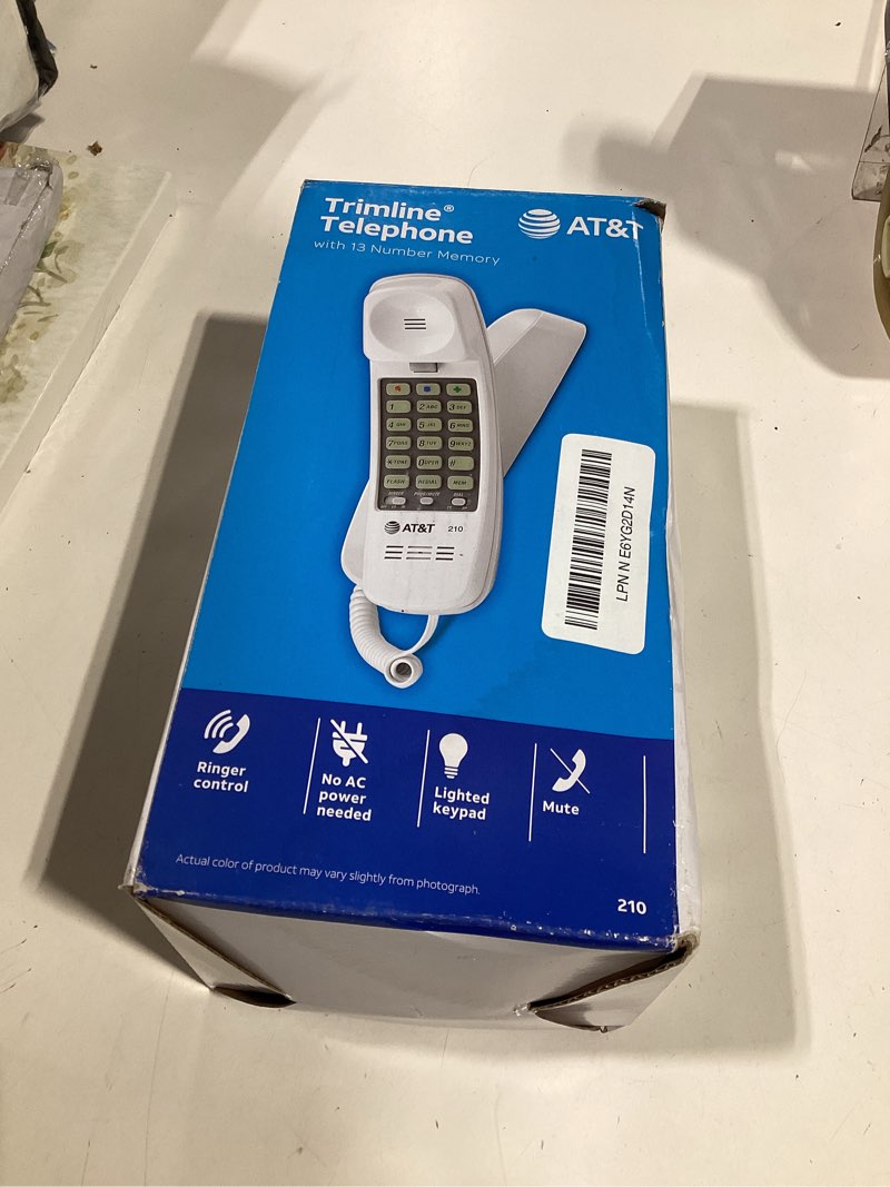 Condition photo showing As Is for 210wh corded trimline phone,lighted keypad, white