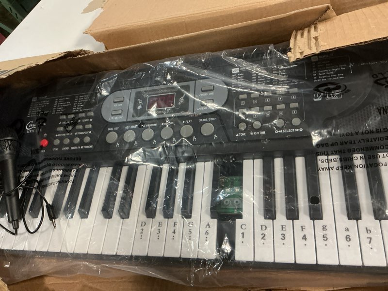 Condition photo showing Good Condition for Hricane Keyboard Piano Lighted Keys for Beginner Adults Teens Kids, 61 Key Electronic Music Keyboard with Teaching Modes Powered by USB or Battery with LCD Display Microphone Headphone Jack Lighted Keys-Black