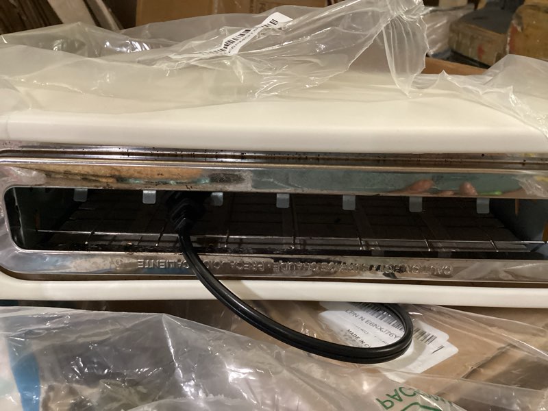 Condition photo showing As Is for martha stewart 2 slice long slot toaster, extra wide for sourdough & bagels, 10 setting shade control, removable crumb tray, self-centering design, defrost/reheat, cancel, slim space-saving, linen linen white