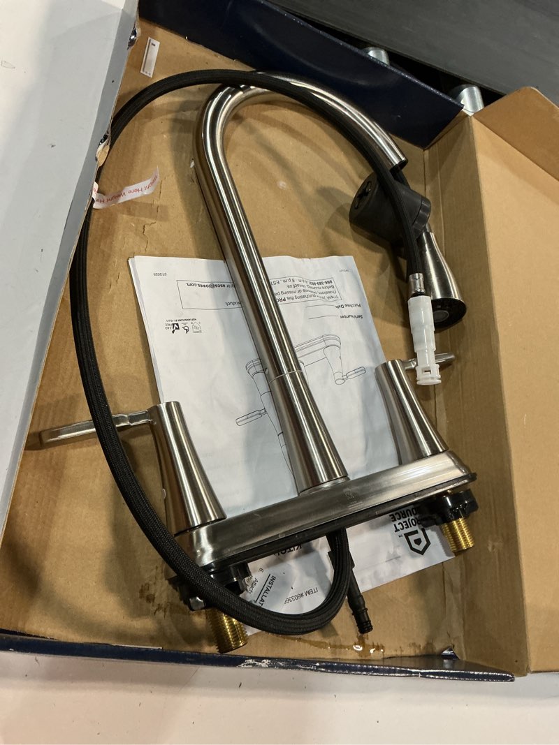 Condition photo showing As Is for project source stainless steel double handle deck-mount pull-out kitchen faucet with sprayer