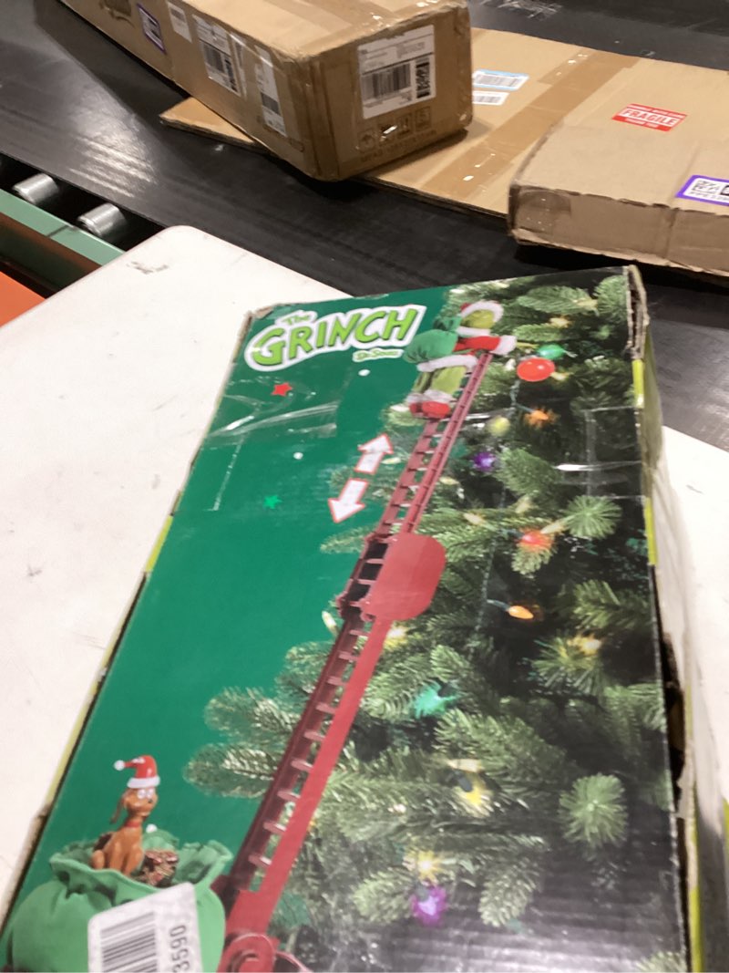 Condition photo showing New/Like New for Mr. Christmas 34.5" Animated Grinch Utility Sleigh Christmas Decoration with Ladder, LED Lights, Mus