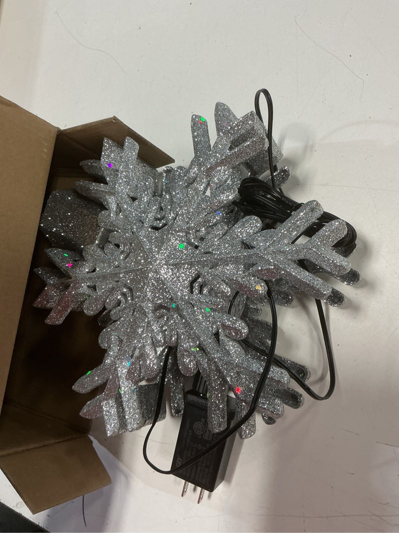 Condition photo showing Good Condition for Christmas Tree Topper, 3D Rotating Silver Snowflake Pattern Projector for Xmas Tree Topper, Hollow Design Christmas Decorations, Christmas Decor Snowflakes