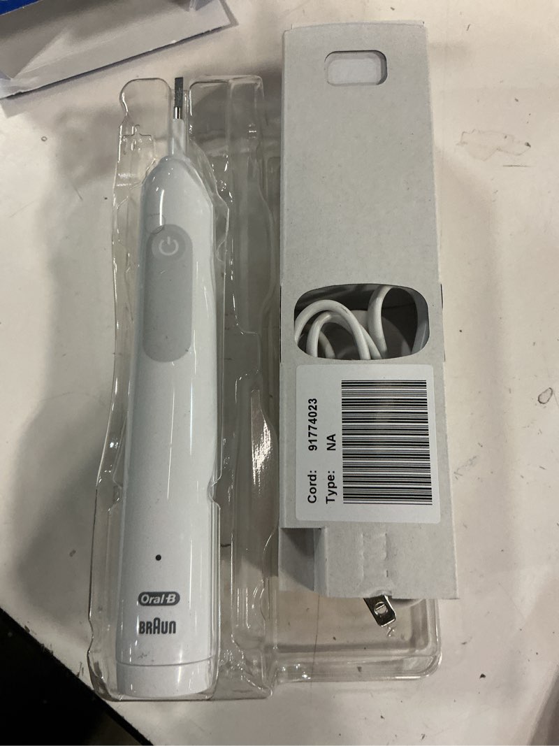 Condition photo showing Good Condition for oral b pro 1000 power rechargeable toothbrush