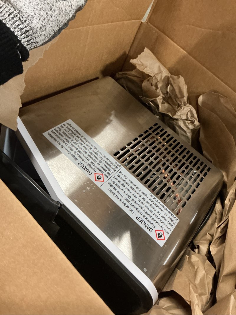 Condition photo showing As Is for Aeitto Countertop Ice Maker Machine, 26lbs Ice in 24H, 8 Bullet Ice Cubes in 6 Mins, Self-Cleaning Portable Ice Maker with 2 Ice Sizes, Basket & Scoop for Home, Kitchen, Office, Stainless Steel Silver