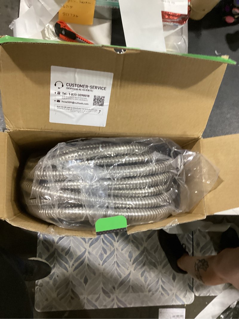 Condition photo showing Good Condition for garden hose 50ft, heavy duty stainless steel water hose with 10 functional nozzles, no kink, lightweight and flexible, easy to use and store, strong and sturdy, suitable for yard and lawn