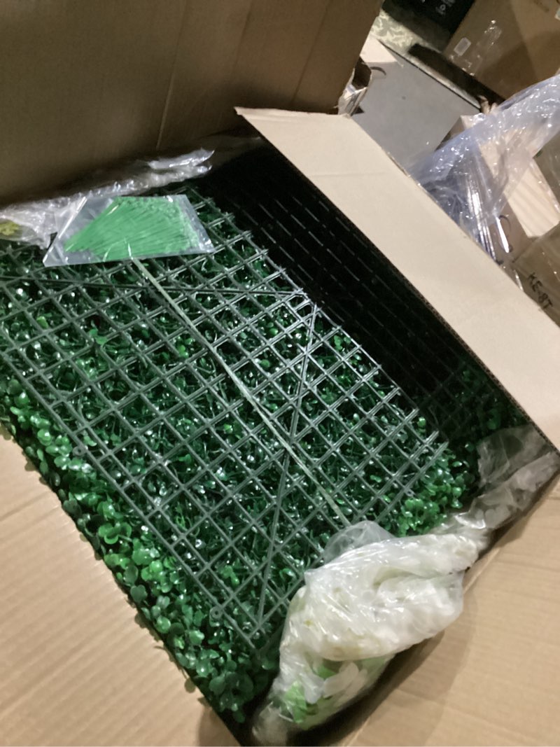 Condition photo showing item condition for 54 Pack Greenery Backdrop with Flowers Include 18 Pcs 16" x 24" Grass Wall Panels Artificial Hedge Boxwood Panels 36 Pcs 3.6 Feet Wisteria Hanging Flowers Garland for Wedding Summer(White)