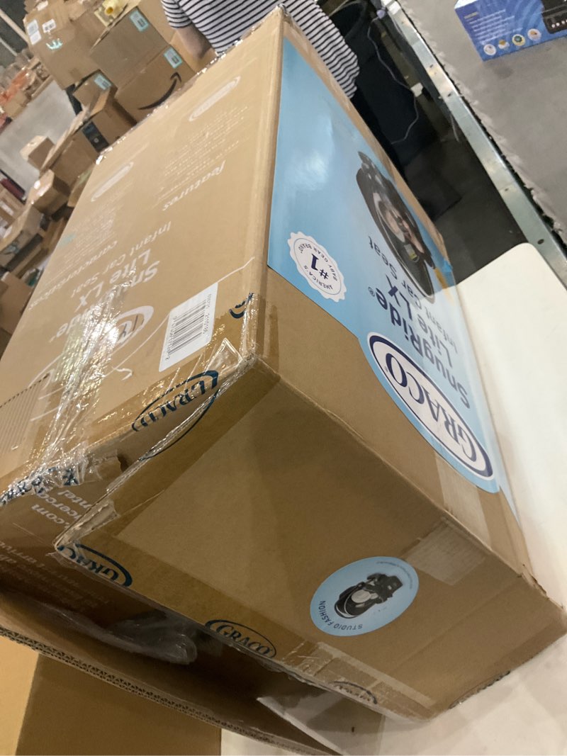 Condition photo showing As Is for Graco SnugRide Lite LX Infant Car Seat, Lightweight Rear-Facing Seat for Babies 4–30 lb, 4-Position Adjustable Base, LATCH Installation & ProtectPlus Engineered, Studio