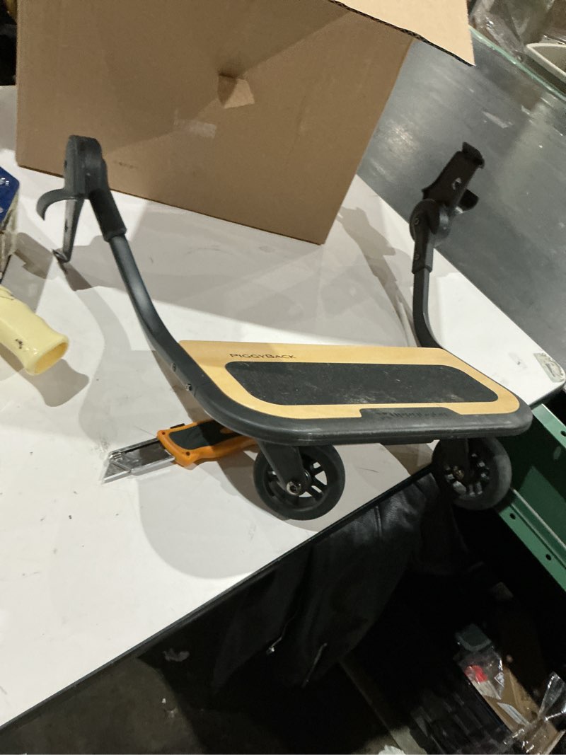 Condition photo showing As Is for uppababy piggyback ride-along board for vista, vista v2, and vista v3 strollers / quick attachment for children to stand + stroll / 55 lbs. weight capacity