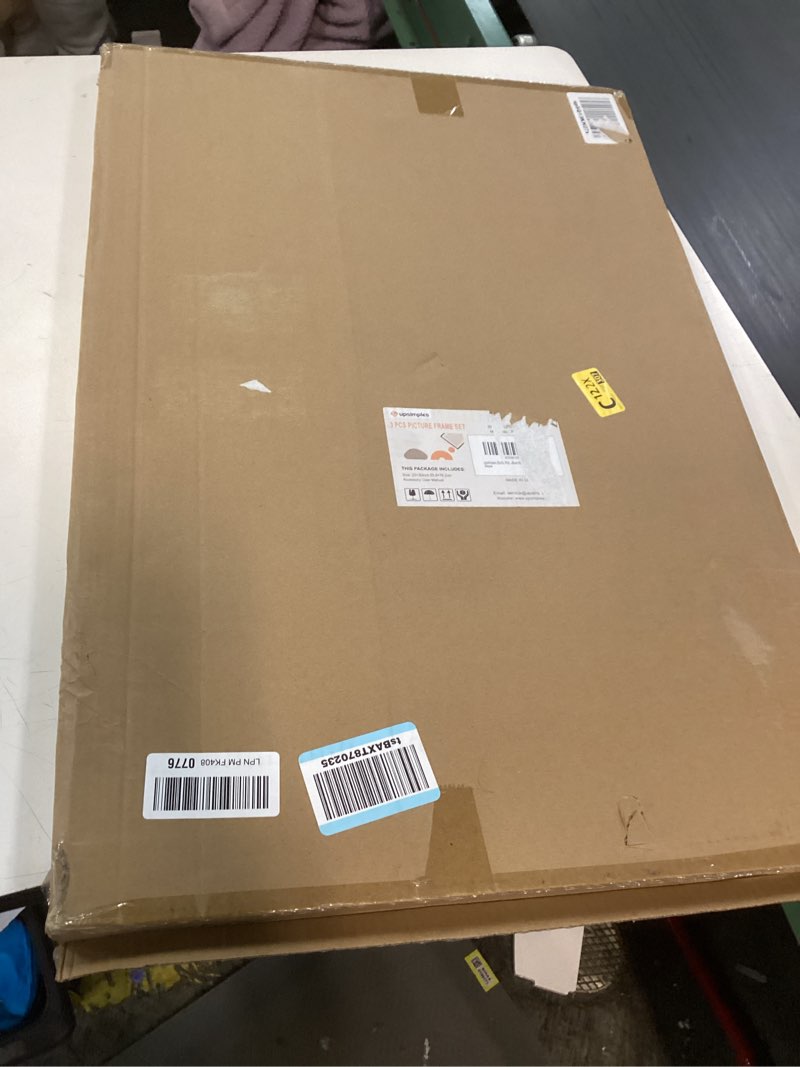 Condition photo showing Good Condition for upsimples 20x30 Picture Frame Gold 3 Pack, Scratch-Proof Poster Frames 20 x 30 for Photo Gallery - Slide-In Strips, Horizontal or Vertical Wall Mounting Gold 20x30