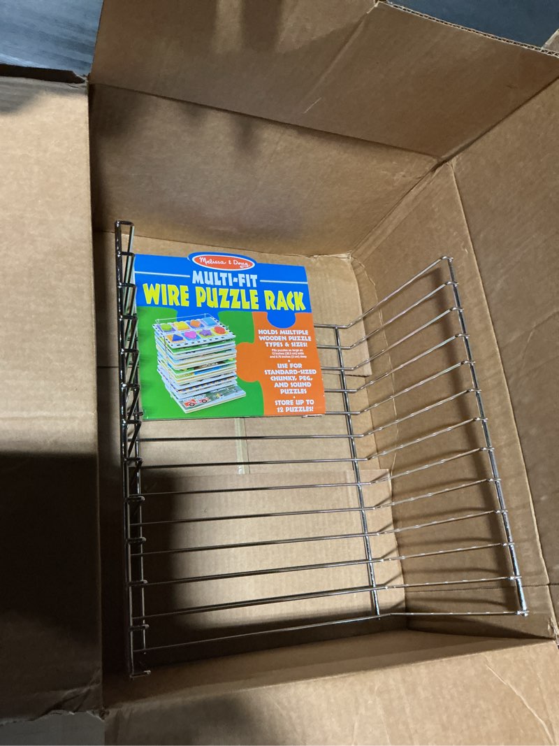 Condition photo showing Good Condition for Melissa & Doug Multi-Fit Metal Wire Puzzle Rack 12 inches wide and 0.75 inches deep Multi Fit