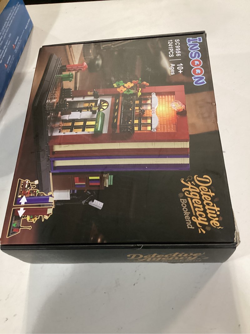 Condition photo showing New/Like New for Detective Bookend Building Set with Lights, 1241 PCS Detective Agency Street House Building Block Kit for Home Decor Bookshelf, Collectible Mystery Bookstand Model for Adults Boys Girls Age 12+