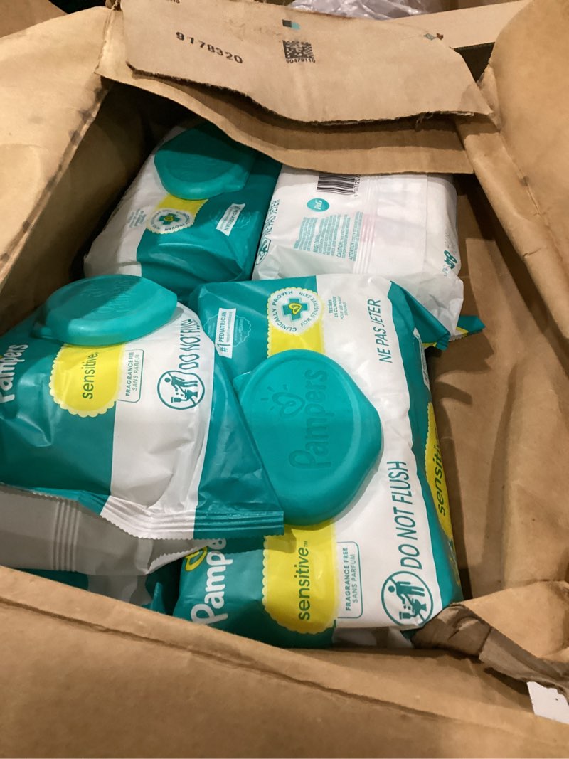 Condition photo showing As Is for pampers sensitive baby wipes, water based, clinically proven, hypoallergenic, and unscented for babies, 1008 wipes total (18 flip-top packs) [packaging may vary] 56 count (pack of 18)