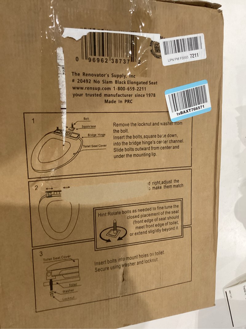 Condition photo showing As Is for renovators supply manufacturing black plastic soft close elongated toilet seat quiet-close lid, contoured seat easy to install and clean, grip-tight bumpers with adjustable mounting hardware