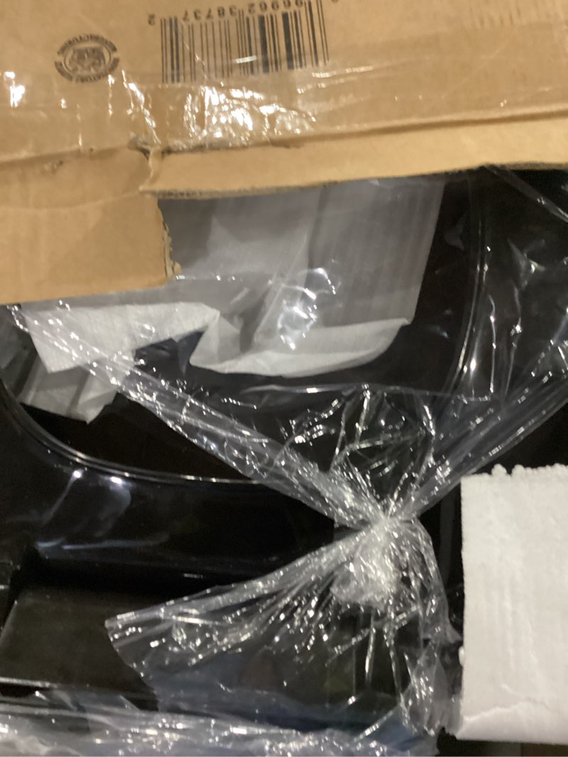 Condition photo showing As Is for renovators supply manufacturing black plastic soft close elongated toilet seat quiet-close lid, contoured seat easy to install and clean, grip-tight bumpers with adjustable mounting hardware