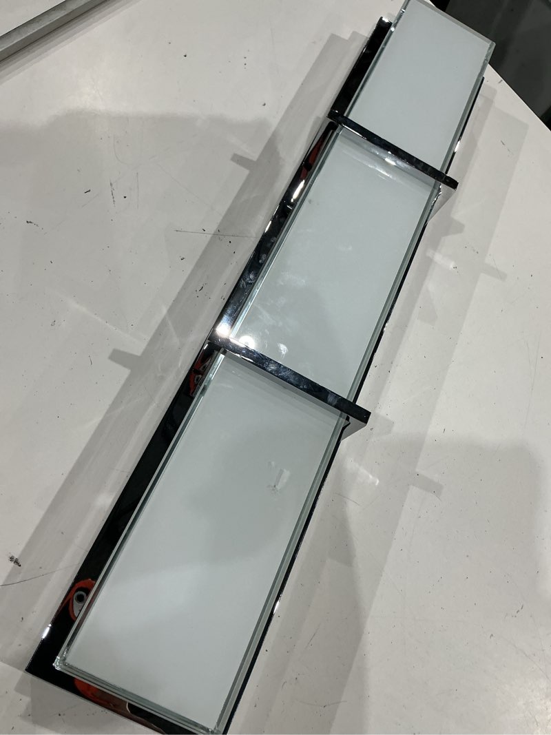 Condition photo showing As Is for origin 21 brighton 27-in 1 light polished chrome integrated led modern/contemporary bathroom