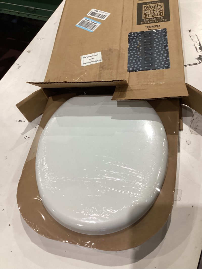 Condition photo showing New/Like New for Mayfair Padded Toilet Seat with Chrome Hinges, Soft Vinyl over Wood Core Seat, Made in USA, Round, White Elongated Seat