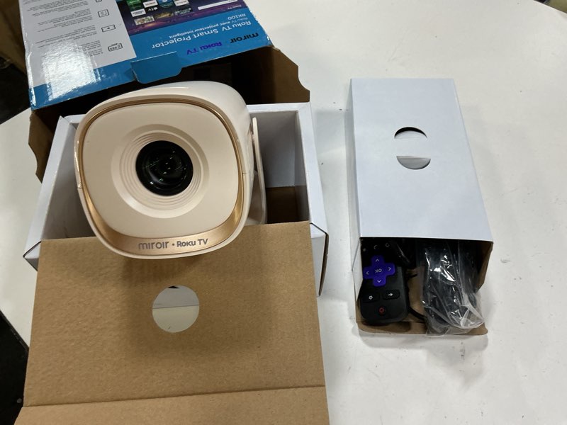 Condition photo showing Good Condition for miroir roku tv smart projector with wifi and bluetooth, dolby audio, 270° rotatable stand, auto keystone & zoom — portable mini outdoor movie projector with roku streaming built-in