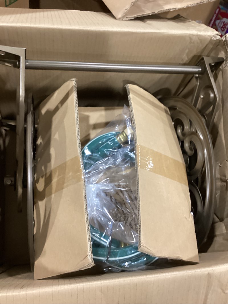 Condition photo showing As Is for liberty garden 708 steel decorative wall mount garden hose reel, holds 125-feet of 5/8-inch hose - bronze