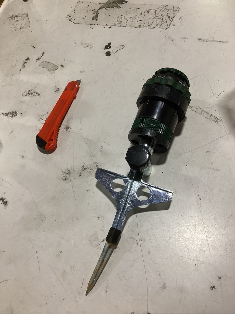 Condition photo showing As Is for (similar to)orbit 58573n h2o-six gear-drive sprinkler on metal t-spike 1