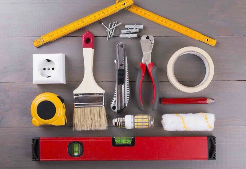 Mixture of small miscellaneous loose tools, screws, latches, home repair accessories