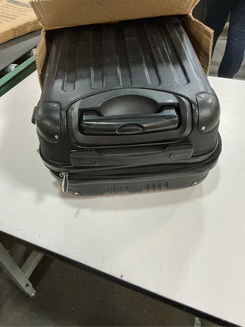 Condition photo showing As Is for rockland london hardside spinner wheel luggage, black, carry-on 20-inch black carry-on 20-inch