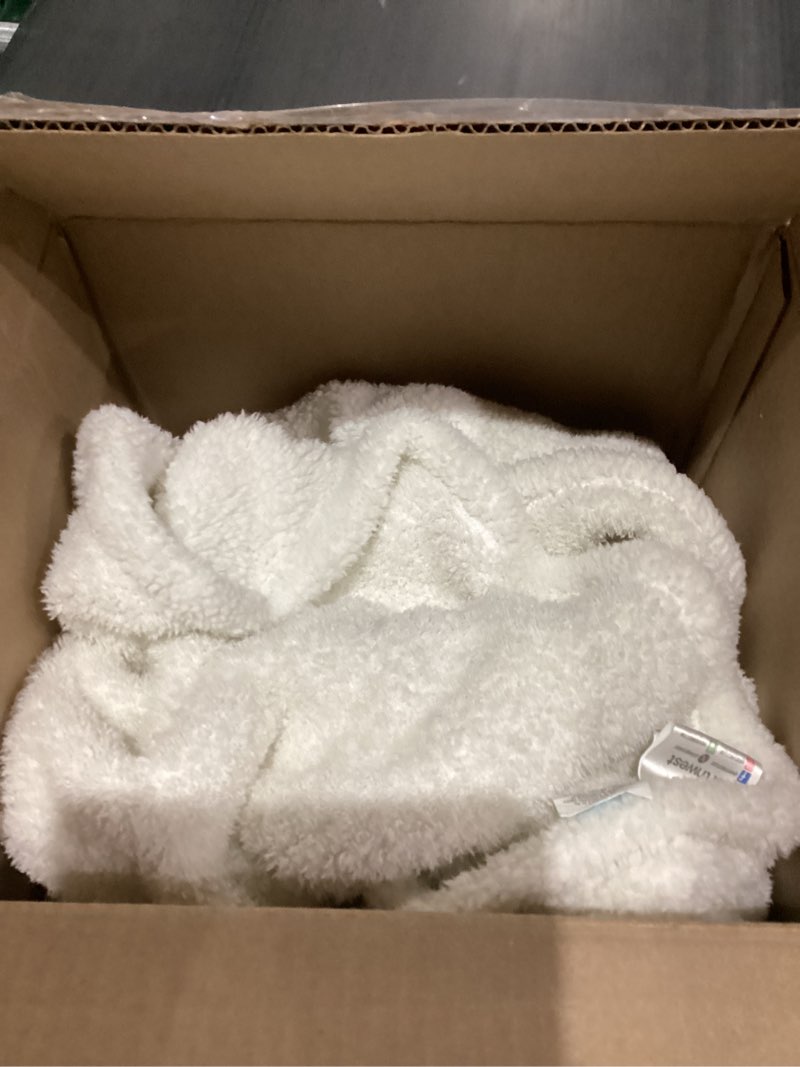Condition photo showing As Is for NORTHWEST HGTV Teddy Sherpa Faux Fur Throw Blanket, Ultra Soft Cozy Layer for Bed or Couch, Plush Velvety Texture for Snuggling, Lounging, or Home Décor, 50 x 70 inches, Ivory