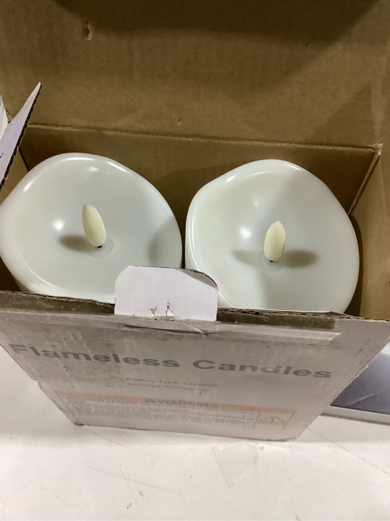 Condition photo showing Good Condition for Raycare 8"x3" Outdoor Waterproof Flameless Candles with Remote and Timer, Battery Operated LED Electric Fake Pillar Candle for Christmas Home Wedding Decor, Ivory White, Set of 2 D3"xH8"8"-Ivory White