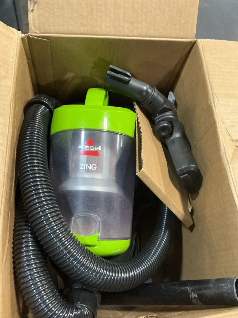 Condition photo showing As Is for Bissell 2156A Zing Canister Bagless Vacuum Zing Canister Lime