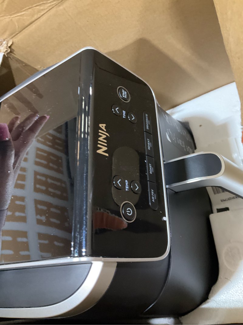 Condition photo showing As Is for Ninja | Air Fryer | 4-in-1 Pro Air Fry, Roast, Reheat, Dehydrate | 5QT Capacity fits up to 4lbs of French Fries | 400F Max Temp | Nonstick Basket & Crisper Plate | 120V | Grey | AF141 5 QT