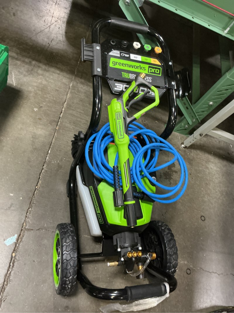 Condition photo showing As Is for greenworks 3000-psi 2.0-gpm cold water electric pressure washer with 5 spray tips