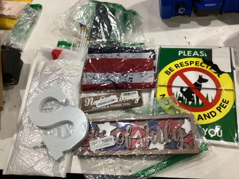 Condition photo showing As Is for assorted flags and signs