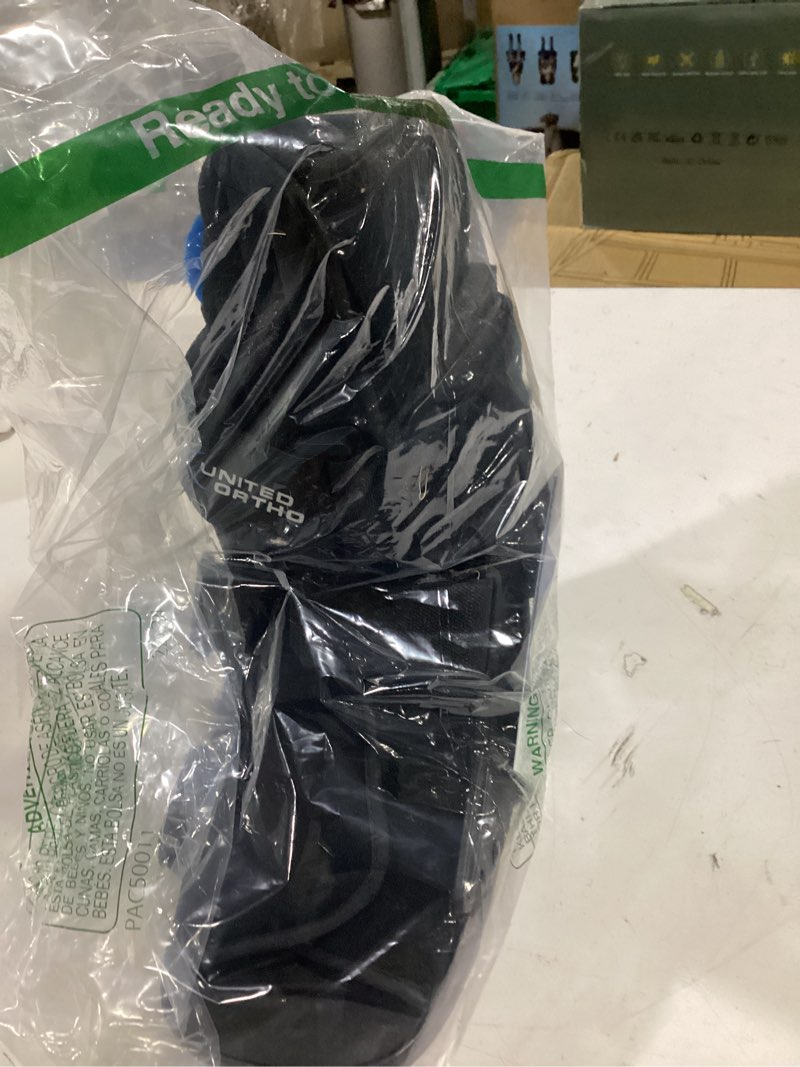 Condition photo showing As Is for united ortho short air cam walker fracture boot, large, black black large boot