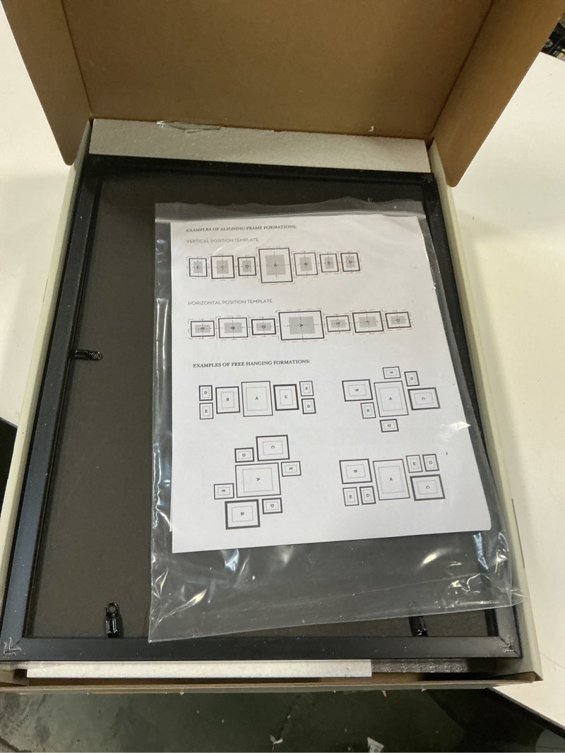 Condition photo showing As Is for Camden Reed 7 Piece Gallery Wall Frame Set, (1) 12x16 Inch, (2) 8x10 Inch, and (4) 6x8 Inch, Black