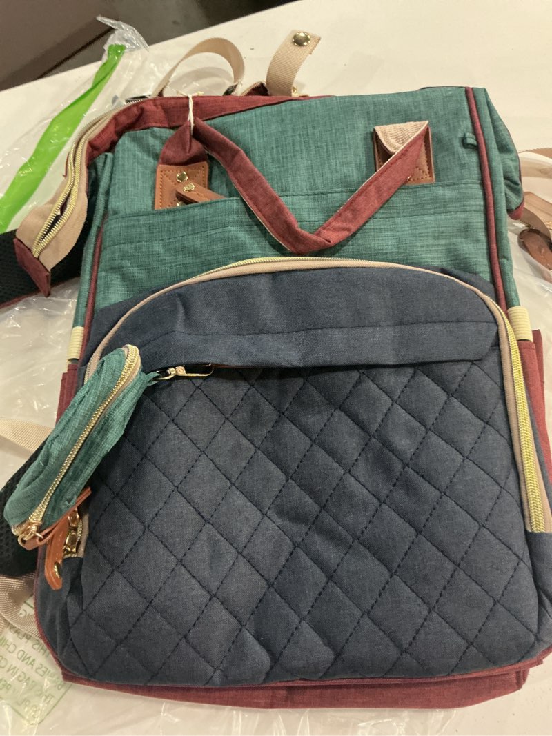 Condition photo showing New/Like New for shitieshou diaper bag backpack baby bag, baby girl boy diaper bag for dad mom with pad, 16 pockets, pacifier case, large diaper bags unisex for travel (colorful)