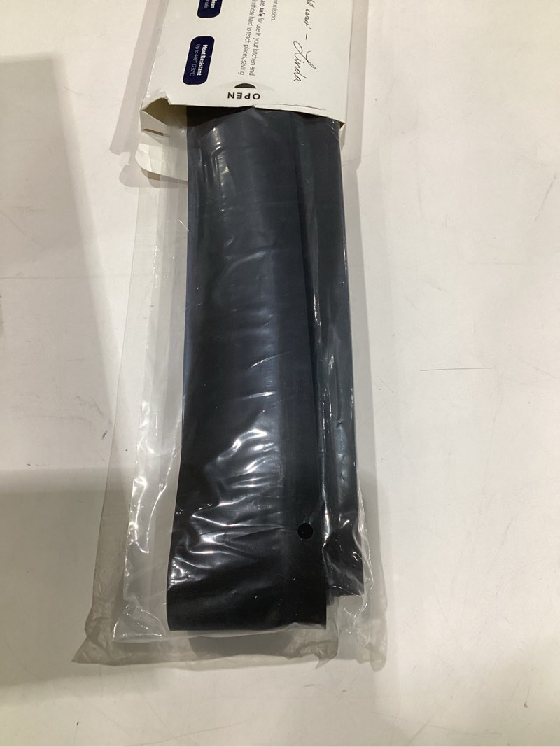 Condition photo showing Good Condition for linda’s essentials silicone stove gap covers (2 pack), heat resistant oven gap filler seals gaps between stovetop and counter, easy to clean stove gap guard (25 inches, black) 25 inches black