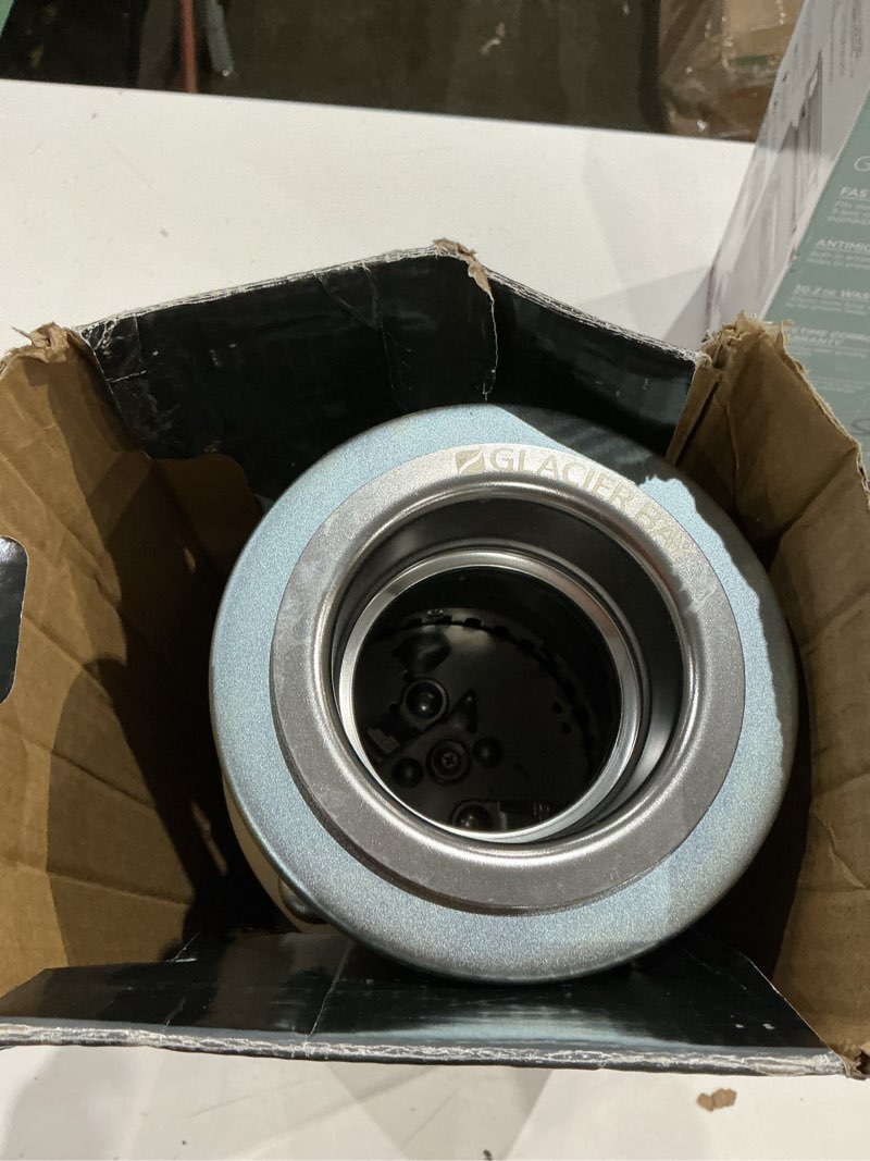 Condition photo showing As Is for glacier bay turbogrind premier 3/4 hp. continuous feed garbage disposal with power cord