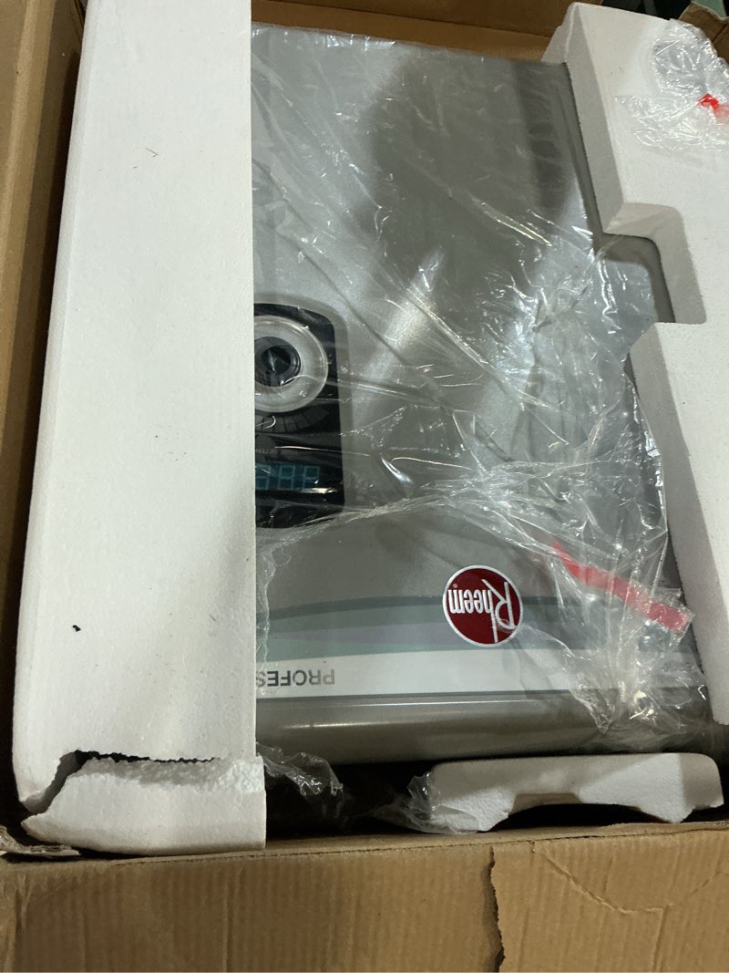 Condition photo showing As Is for rheem 18kw 240v tankless electric water heater, gray whole home, 18 kw